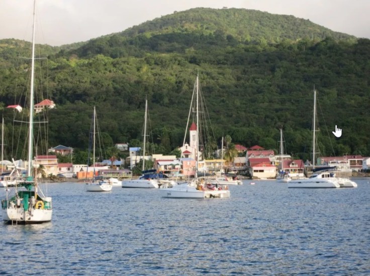 2017_12_12_10_30_36_Guadeloupe_Deshaies_Finally_a_protected_anchorage_IT_S_A_DOGS_LIFE